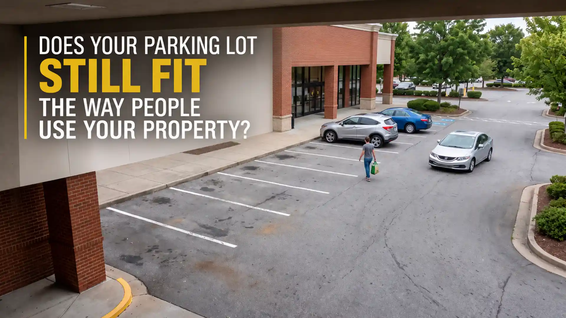 Parking Lot Marking Experts in Oakville reviewing parking stalls, vehicle movement, pedestrian access, and property layout at a commercial parking area