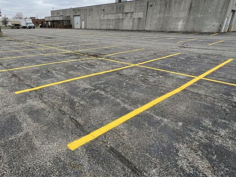 Freshly repainted parking lot lines after professional line marking