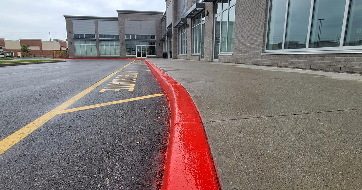 Fire route pavement markings painted on commercial property